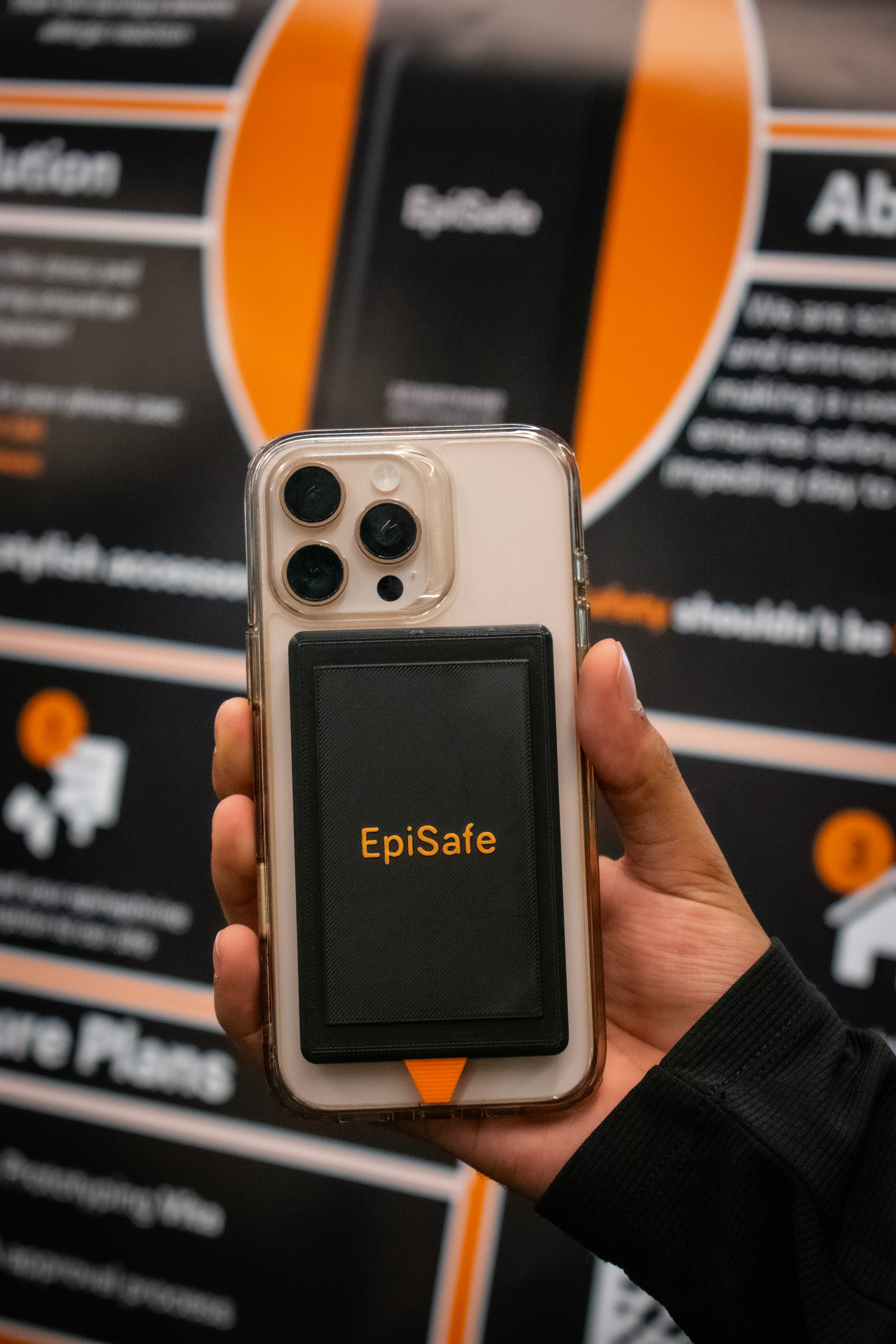 EpiSafe phone case prototype held in hand at Demo Day